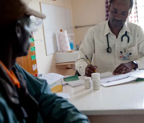MSF treats more than 200,000 people worldwide for HIV and 97 percent of the antiretrovirals are quality, affordable generics from India. Here, an MSF doctor in Kenya consults one MSF’s thousands of HIV+ patients under treatment. 